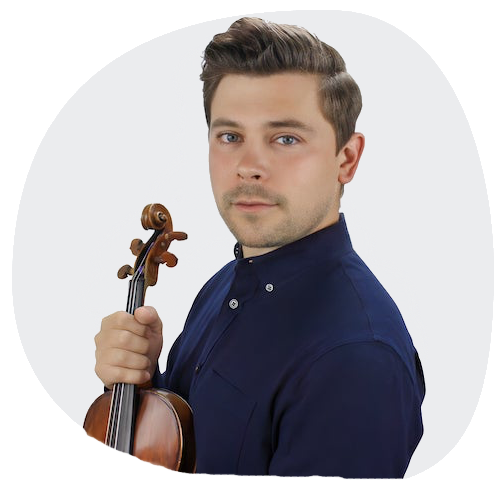 Photo of Edmund Bagnel holding violin. Wearing Navy colored button down shirt. 